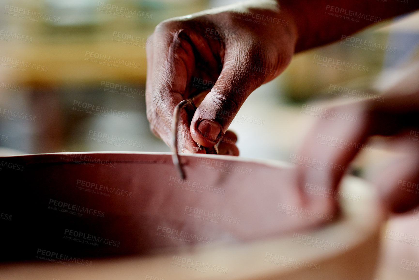 Buy stock photo Potter, clay and hands with tool in workshop for sculpture trim, design process and ceramics shaping. Small business, pottery and person with handmade bowl for handicraft, production or manufacturing