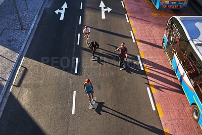 Buy stock photo Group, skating and friends with skateboard, road and active for race in city, fitness or drone. Outdoor, above and travel for competition on street, skateboarding and practice for game or people
