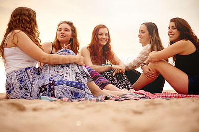 Buy stock photo Beach, happy girls and friends relax on holiday, travel and conversation with students on gap year. Gen z group, low angle and summer vacation with gossip story, talking and women bonding on island