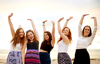Buy stock photo Happy women, portrait and friends with beach sunset in celebration for holiday or weekend together. Female people, group or community with smile or cheering in joy for summer vacation on ocean coast