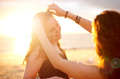 Buy stock photo Women, friends and smile on beach with sunset, travel and vacation for summer holiday. Girls, friendship and relax for bonding, adventure and together by ocean sand for love and Miami journey