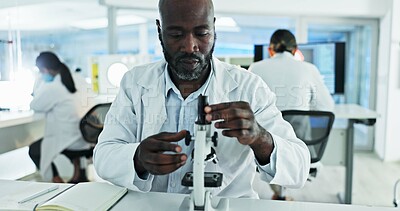 Buy stock photo Scientist, man and study with microscope, analysis and sample preparation in biotech laboratory. Biochemistry, bacteria and solution with technician for DNA research, genetic innovation or results