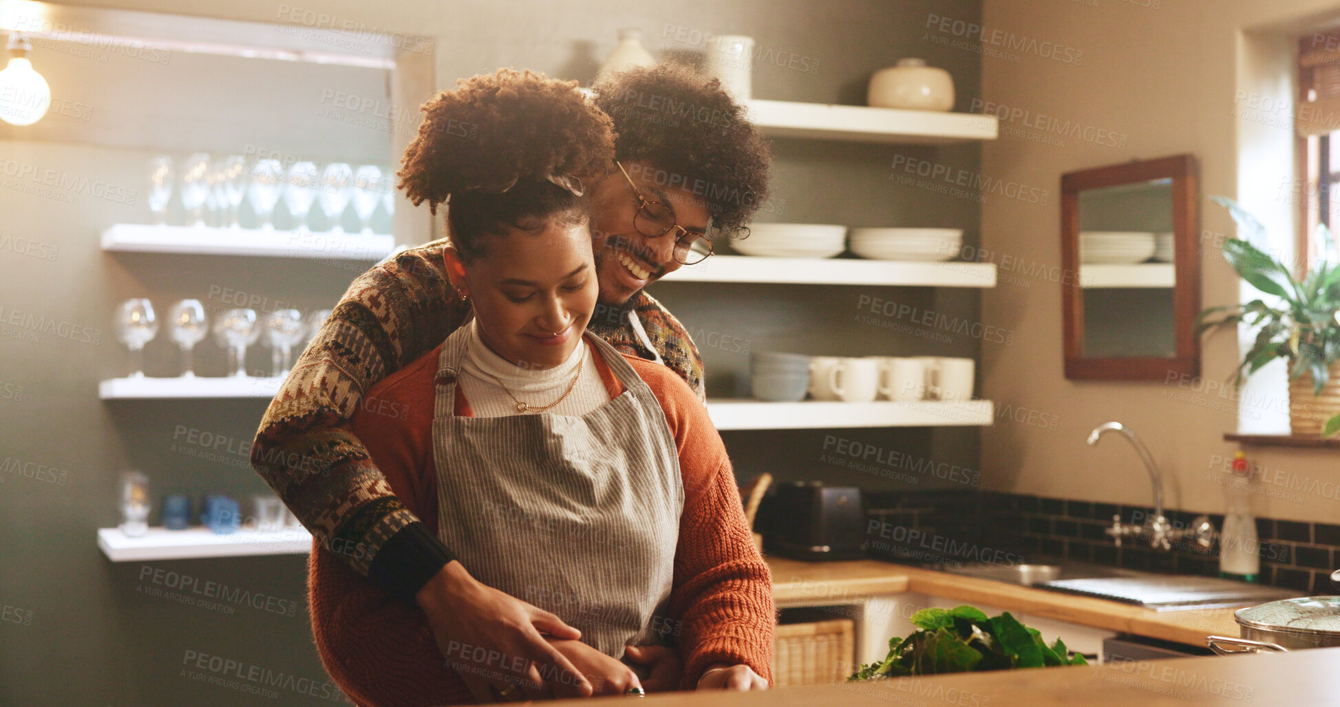 Buy stock photo Couple, woman and cooking with romance in kitchen for meal preparation, healthy dinner and bonding together. Happy, people and helping with food recipe in home for nutrition, marriage and connection
