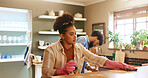 Woman, cloth and cleaning with spray by kitchen counter in home with partner, gloves or routine in morning. People, relationship and ppe with chemical for bacteria, germs or disinfectant at apartment