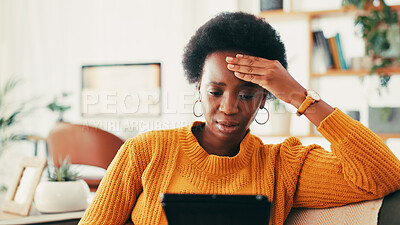 Buy stock photo Black woman, tablet and stress on sofa in home for bad news, recession or financial crisis for economy. Person, headache and frustrated with notification for inflation, taxes and app in living room