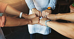 Teamwork, fist bump and cafe with support, huddle and friendly service with hospitality. Group, barista and employees in coffee shop, hand gesture and cooperation with collaboration and thank you