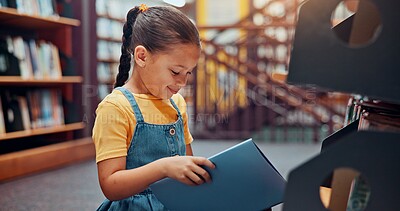 Buy stock photo Girl, kid and reading book in library, learning and smile with fantasy, education and vocabulary. School, student and child development with information, storytelling and growth with novel and relax