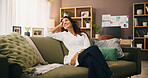Thinking, happy and woman on sofa to relax in home for resting, comfortable and memory on weekend. Smile, laughing and person on couch with inspiration, wondering and nostalgia in living room