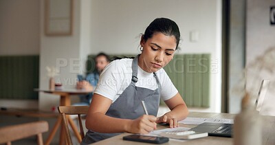 Buy stock photo Coffee shop, writing and woman for planning in cafe for menu items, inventory and order checklist. Restaurant, hospitality and business owner with laptop for budget report, review and service