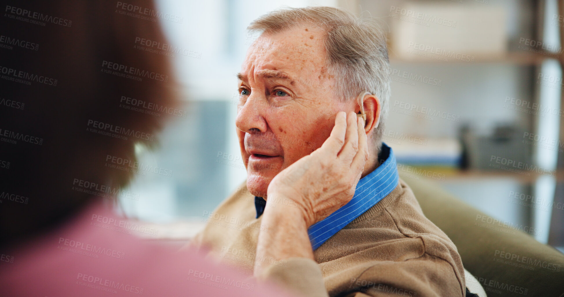 Buy stock photo Hearing aid, consultation and nurse with senior man in clinic office for healthcare helping. Talking, medical and caregiver with deaf elderly male patient for audiology implant at nursing home.