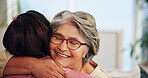Hug, support with old woman and daughter in home, family for love and bonding for comfort in living room. Peace, trust and embrace with senior mom, female person and gratitude together at house