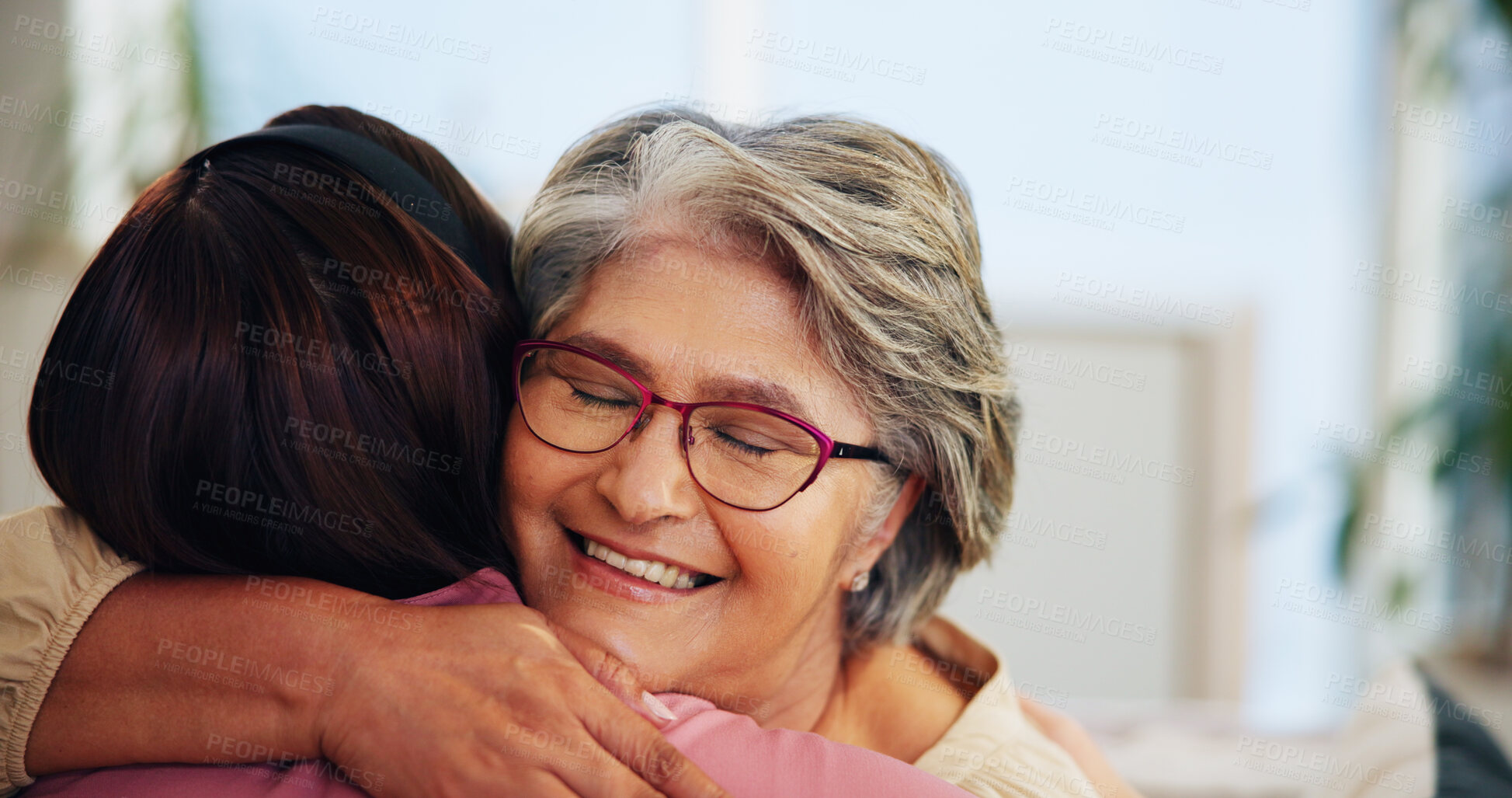 Buy stock photo Hug, support with old woman and daughter in home, family for love and bonding for comfort in living room. Peace, trust and embrace with senior mom, female person and gratitude together at house