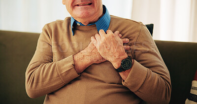 Buy stock photo Heart attack, chest pain and hands of senior man on sofa with worry for emergency, medical crisis and heartburn. Retirement, home and mature person with discomfort, breathing strain and stroke