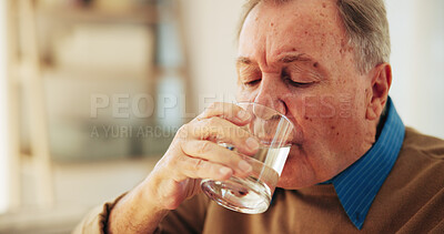 Buy stock photo Drinking, water and senior man in home, healthcare and prevention of dehydration, thirsty and retirement. House, hydration and elderly person with liquid in living room, treatment and pensioner