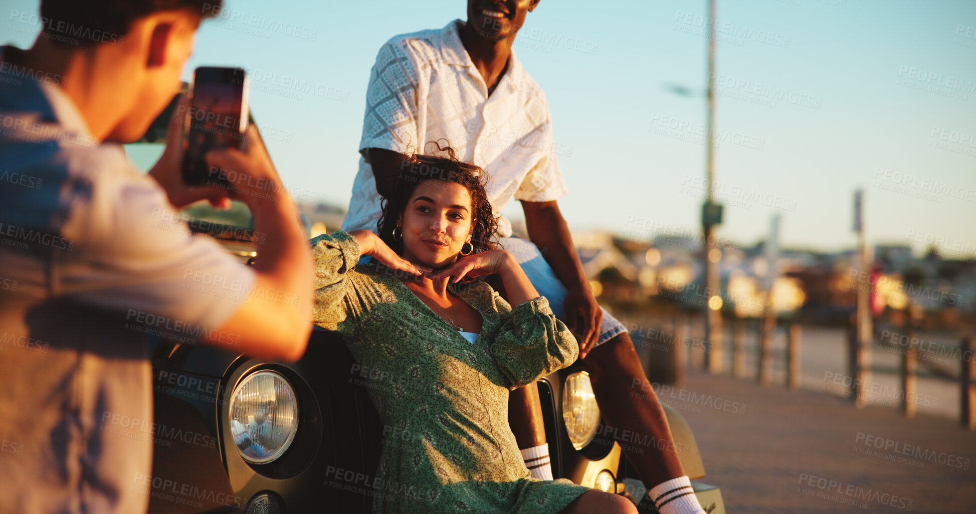 Buy stock photo Phone, photography and friends on road trip with fun holiday, smile and outdoor bonding together. Relax, digital picture and people on car with cellphone, travel adventure or happy memory on vacation