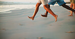 Running, feet and group on vacation, beach and friends with energy in paradise, outdoor and bonding. Summer holiday, legs and people on getaway in nature, ocean and speed on weekend, together or trip