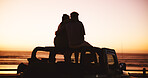Sunset, romance and silhouette of couple on road trip with holiday, hug and outdoor bonding together. Relax, man and woman embrace on car with back, space and love on travel adventure vacation