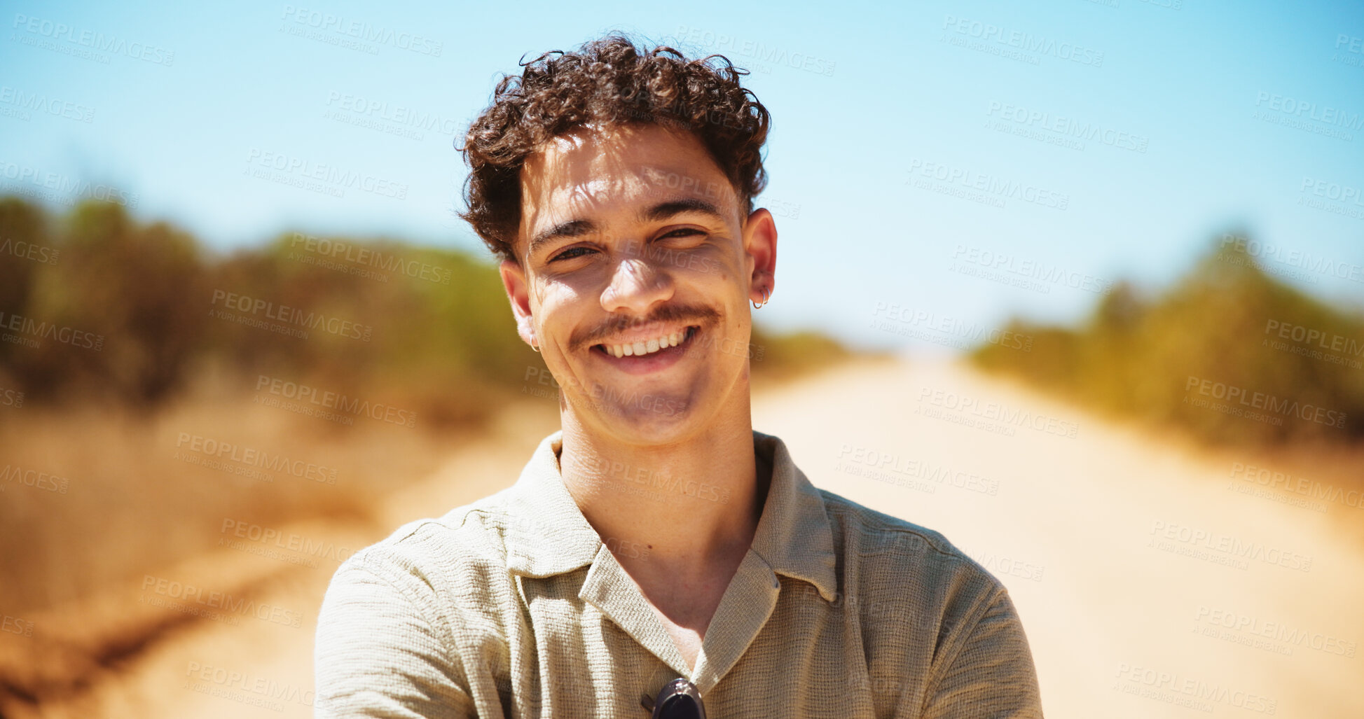 Buy stock photo Happy, nature and portrait of man in desert for vacation, getaway or weekend trip outdoor. Smile, confident and face of male person from Mexico for holiday with sightseeing, journey or adventure.