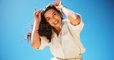 Buy stock photo Fashion, portrait and woman with smile, outdoor and stylist with confidence for career, sky and clothes. Blue background, employee and person with happiness for outfit, mockup and low angle in Canada