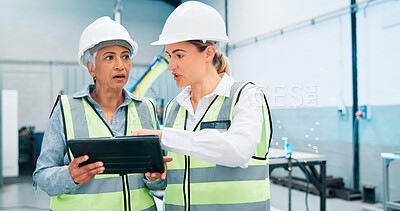 Buy stock photo Women, robotics and teamwork in factory, tablet and inspection results with online schedule. Employees, engineering and people in lab, technician and software update with app, feedback and shocked