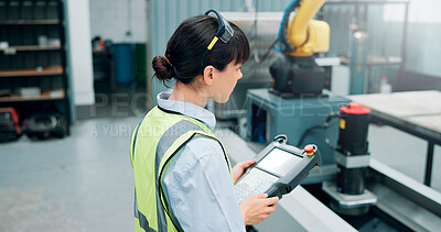 Buy stock photo Woman, technician and tablet at machine factory for research, robotics update and technical guide. Engineer, digital remote control and production manual, automation safety and manufacturing process