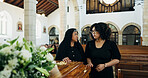 Funeral, women and family with coffin in church for farewell service, mourning death or grief. Respect, goodbye or people with casket or flowers in Christian cathedral for burial, support or memorial