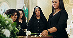 Flower, people or family with coffin in funeral for farewell service, mourning death or grief. Church, goodbye or respect with casket or rose in Christian cathedral for burial, support or memorial
