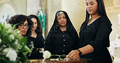 Buy stock photo Flower, people or family with coffin in funeral for farewell service, mourning death or grief. Church, goodbye or respect with casket or rose in Christian cathedral for burial, support or memorial