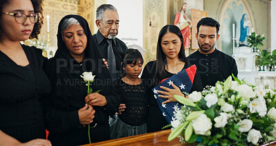 Buy stock photo Funeral, death or family loss with flag or coffin in church for farewell service or mourning army veteran. America, casket or grieving with kid, people or flowers for burial, soldier or ceremony