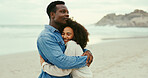 Hug, support and love with interracial couple at beach for romantic vacation, travel adventure and bonding. Happiness, holiday and partner with man and woman embrace for honeymoon, trust and date