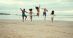 Back, jumping and people on beach with freedom, travel or excited on summer vacation. Friends, energy and running at ocean space for holiday, water adventure or bonding at reunion at tropical island