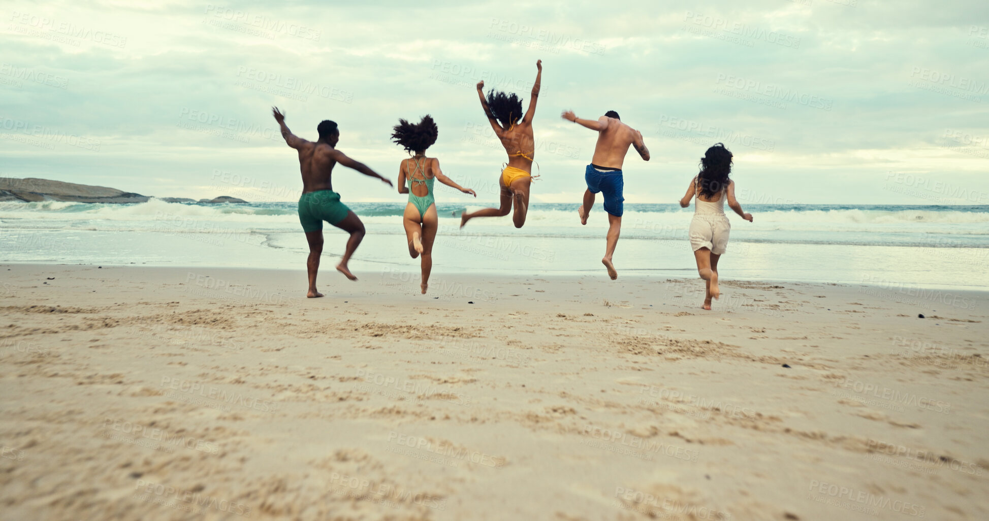 Buy stock photo Back, jumping and people on beach with freedom, travel or excited on summer vacation. Friends, energy and running at ocean space for holiday, water adventure or bonding at reunion at tropical island