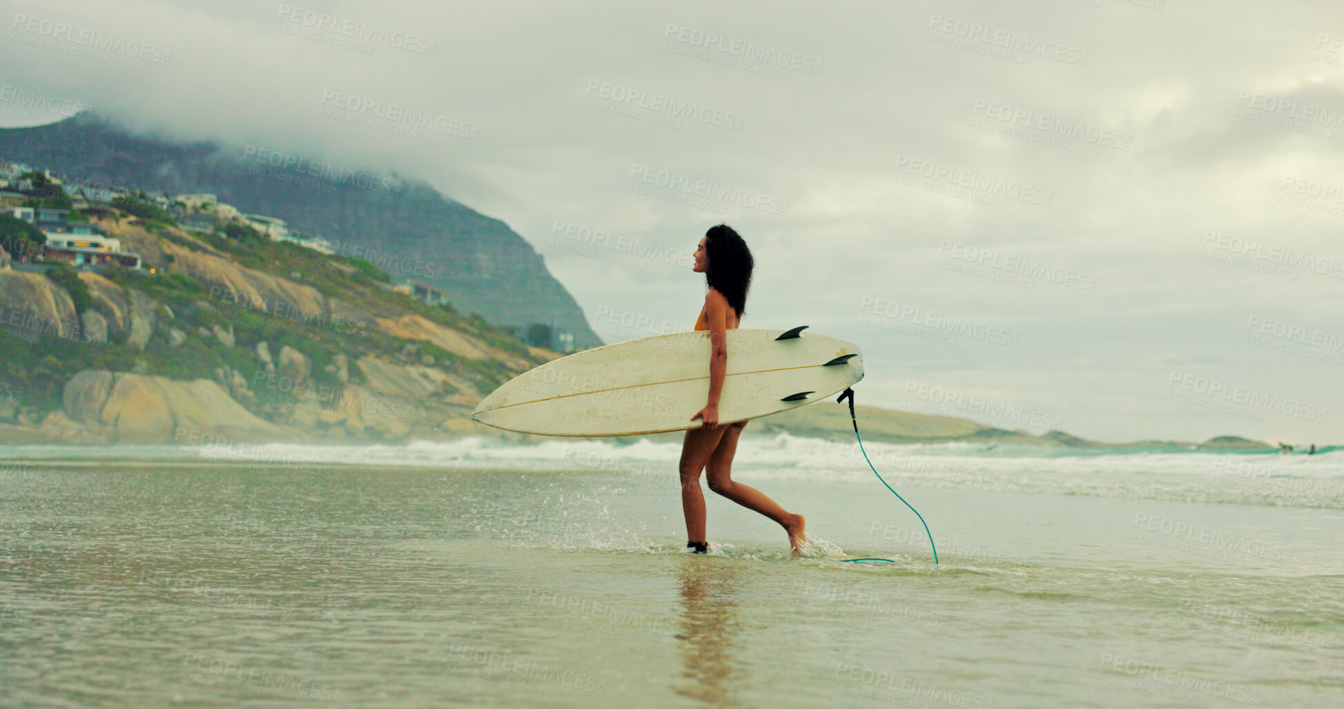 Buy stock photo Girl, surfboard and walk at beach with waves for water sports, hobby and outdoor in morning on holiday. Woman, surfer and happy for training, fitness and start with exercise by ocean in Costa Rica