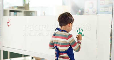 Buy stock photo School, painting hands and child with paper for creative lesson, education and development. Kindergarten, student and kid learning with colors for fun activity, art project and motor skills in class