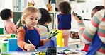 Education, girl and students in classroom, painting and creative lesson with artwork project, learning and teaching. Children, kids and development with mobility, artist and fun activity in school