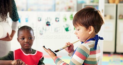 Buy stock photo Education, kids and students in classroom, painting and creative lesson with artwork project, hand and teaching. Children, learning and development with mobility, artist and fun activity in school