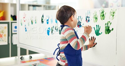 Buy stock photo Education, kid and student in classroom, painting and creative lesson with artwork project, canvas or fun activity. Pattern, learning academy or development with mobility, artist or growth in school