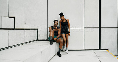 Buy stock photo Runner, talking and phone with black couple in city for fitness app, tracking progress and workout plan. Wellness, training and marathon with man and woman outdoors for stairs, sports and team