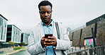 Walking, phone and business man in city online for morning commute, travel and journey to office. Professional, corporate and African person on smartphone for networking, contact and internet in town
