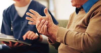 Buy stock photo Home, nurse and senior man with wrist pain, inflammation and muscle tension with joint injury. Closeup, medical and caregiver with elderly patient, advice and report with crisis, consulting and app