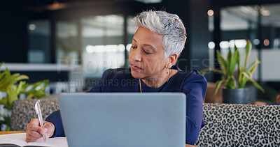 Buy stock photo Business, laptop and writing with woman in coffee shop for hospitality, remote work or research. Computer, freelance startup and planning with mature employee in cafe or restaurant as entrepreneur