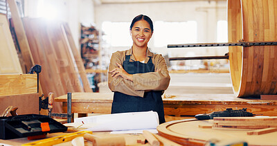 Buy stock photo Arms crossed, carpentry and plans with portrait of woman in workshop for manufacturing or production process. Design, industry and smile with carpenter in woodwork studio for crafting or manual labor
