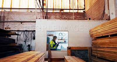 Buy stock photo Man, tablet and wood at warehouse, scroll and industry for typing report at lumber plant. African person, carpenter and digital touchscreen with app for timber, material and stock order at factory