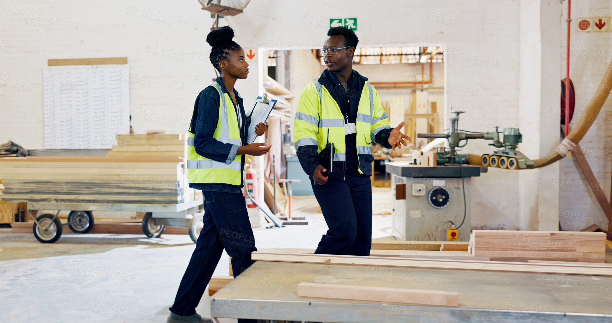 Buy stock photo Man, woman and clipboard for wood at warehouse with planning, team and inspection at plant. African people, checklist and discussion for project, manufacturing or collaboration at industrial factory