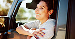Happy woman, passenger or relax in car for road trip, adventure or sightseeing journey in nature. Female person, travel and smile with window for transportation, holiday or weekend getaway in vehicle