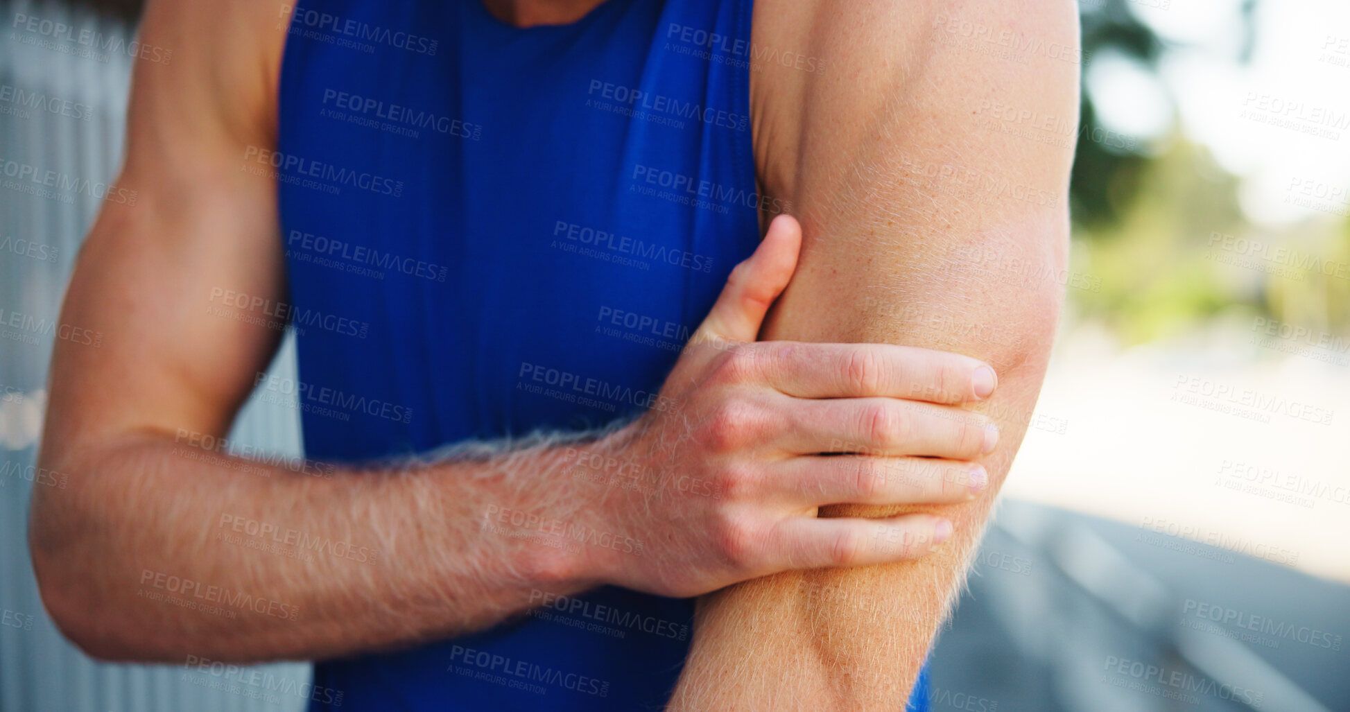 Buy stock photo Person, arm pain or fitness injury in city, muscle cramps or tension with exercise mistake. Fibromyalgia, discomfort and male athlete hand with tendon tear, sports fracture or inflammation outdoor