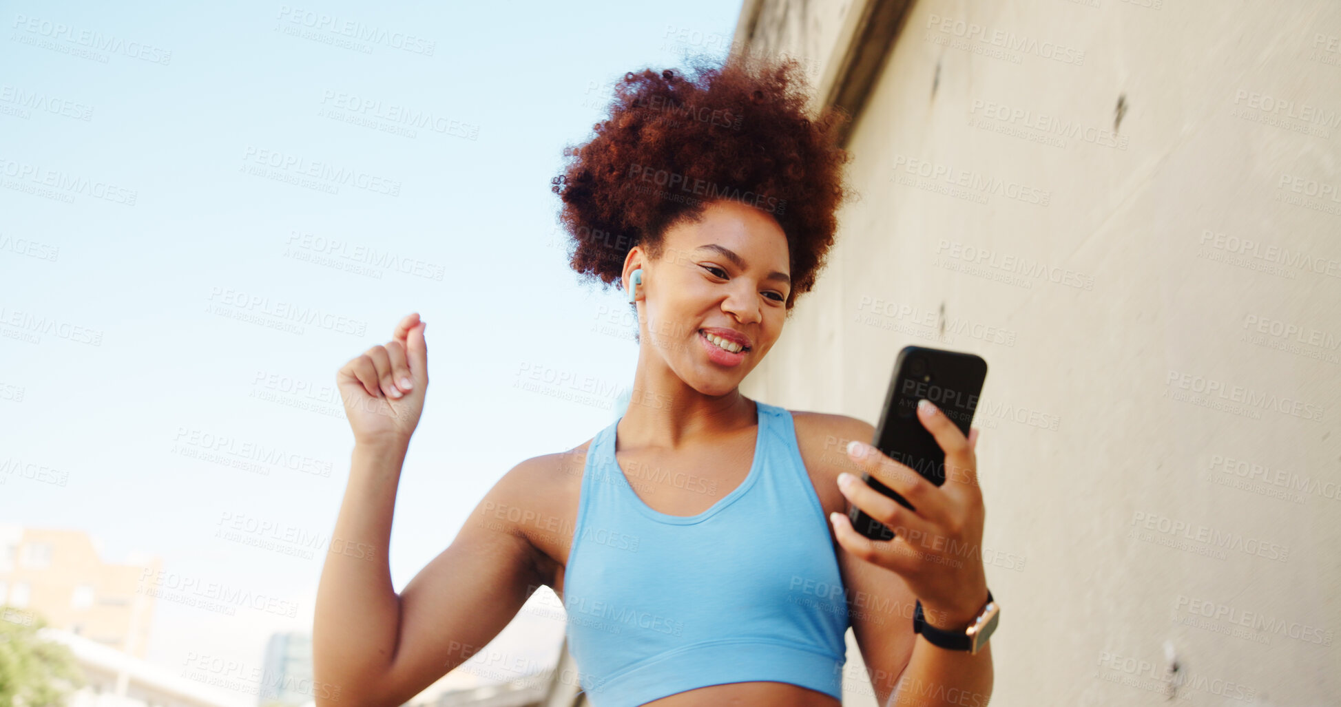 Buy stock photo Fitness, dancing and girl on break in city for running, outdoor workout or training motivation. Playlist, earphones and happy runner with music for sports routine, exercise or wellness for health