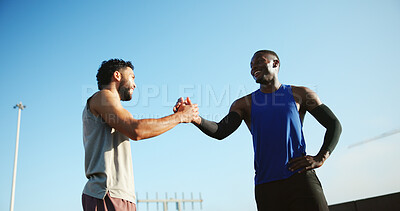 Buy stock photo Happy men, fitness and city with handshake for teamwork, meeting or greeting together. Active, male people or friends shaking hands with smile for workout, exercise or training in an urban town