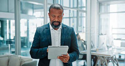 Buy stock photo Office, businessman and reading with tablet for financial advisor, corporate website and investment. Career, mature person and finance consultant with digital for risk management, report and research