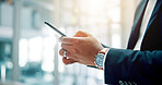 Cellphone, hands and businessman in office for communication, contact or networking online for career. Phone, closeup and male financial manager with email for investment, profit or finance report.